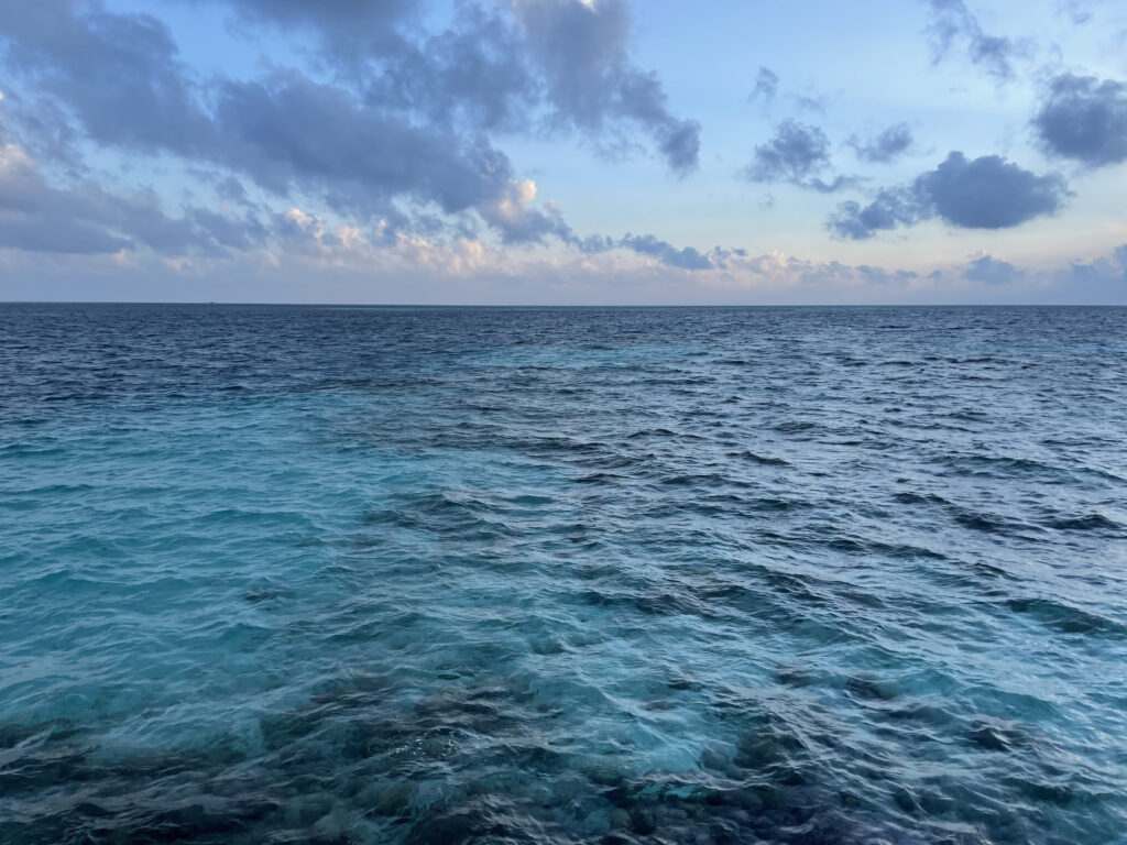 tropical beach with waterbungalows maldives