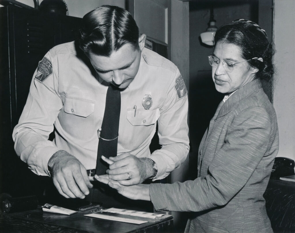 Rosa Parks being fingerprinted by Deputy Sheriff D.H. Lackey after being arrested on February 22 1956 during the Montgomery bus boycott