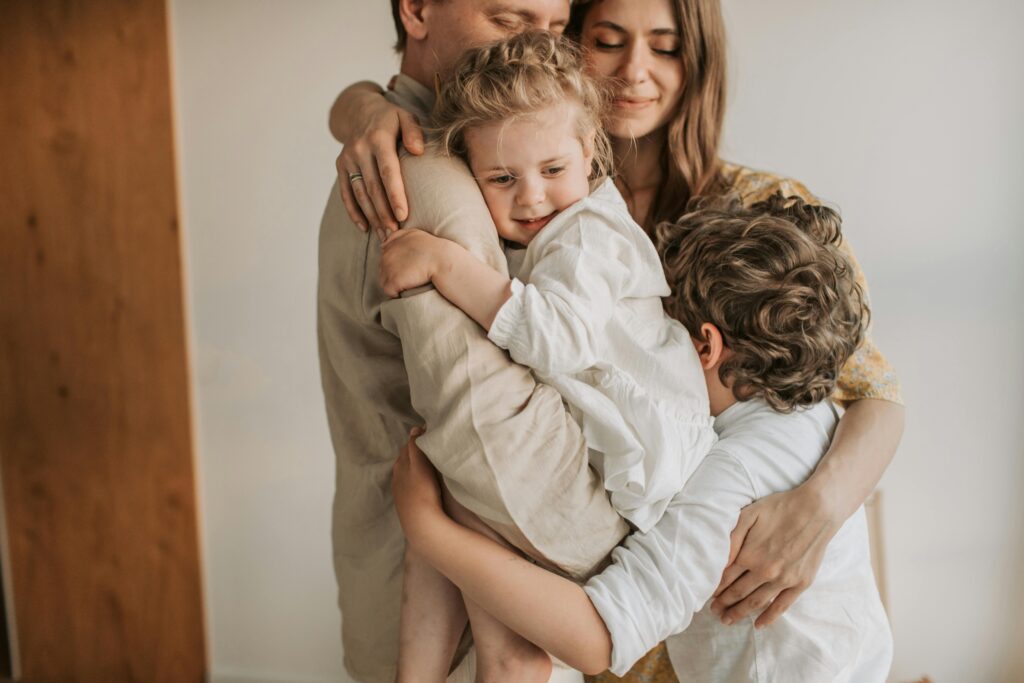 Family embracing in a warm moment.