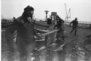 Chernobyl liquidators cleaning radioactive debris