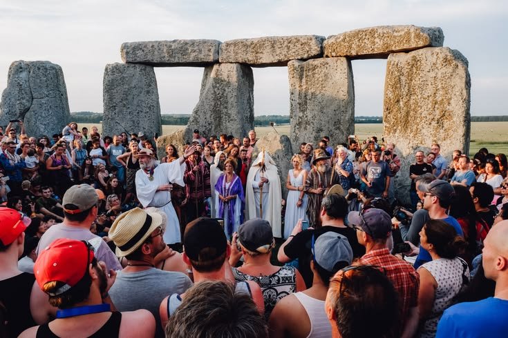 Visitors exploring Stonehenge during summer solstice celebrations